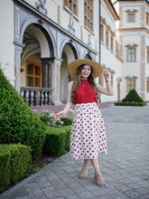 A woman wears silk skirt